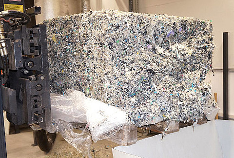 Forklift with shredded post-consumer films